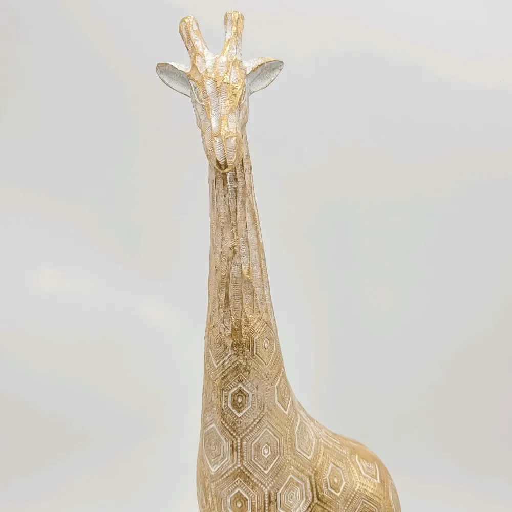 Figura jirafa dorada 12x7x47